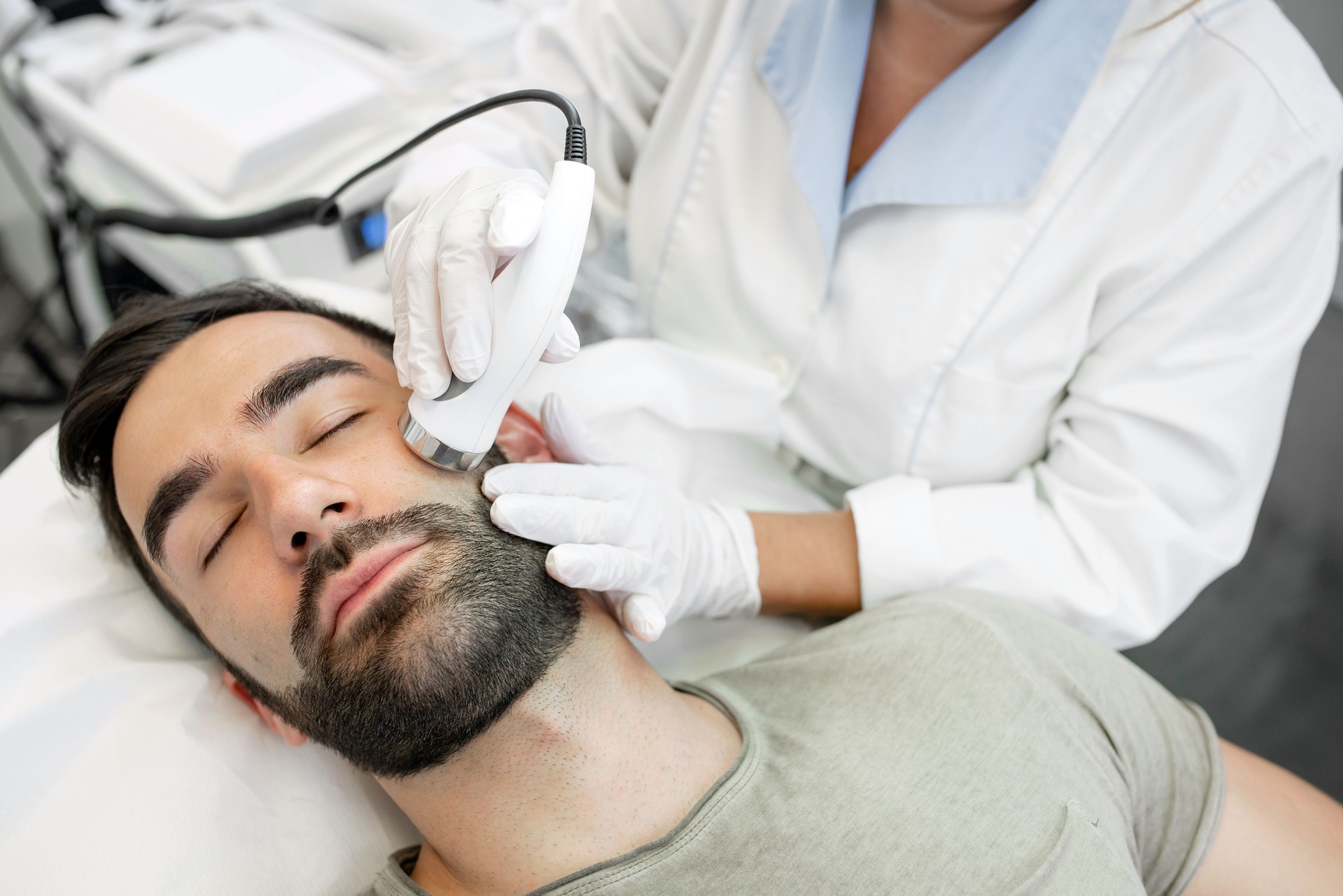 Professional Beautican Provides Ultrasound Facial Treatment